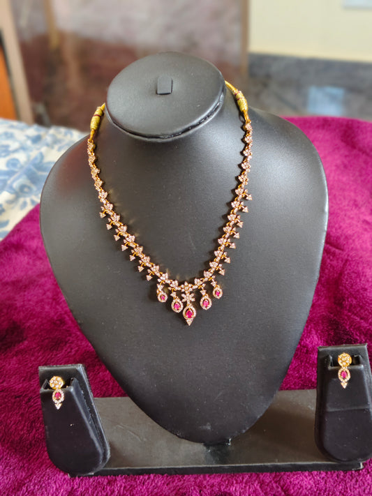 STUNNING NECKSET WITH DROPPING RUBIES