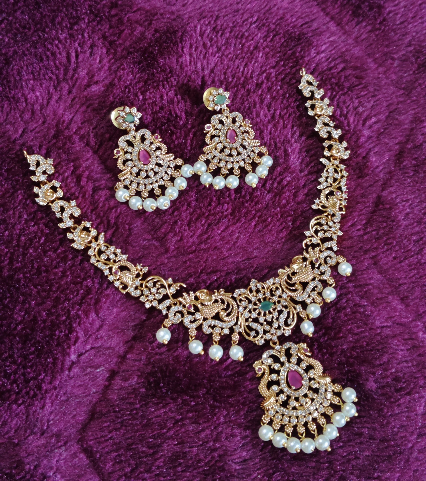 SHORT NECK SET WITH CZ STONE WORK AND PEACOCKS