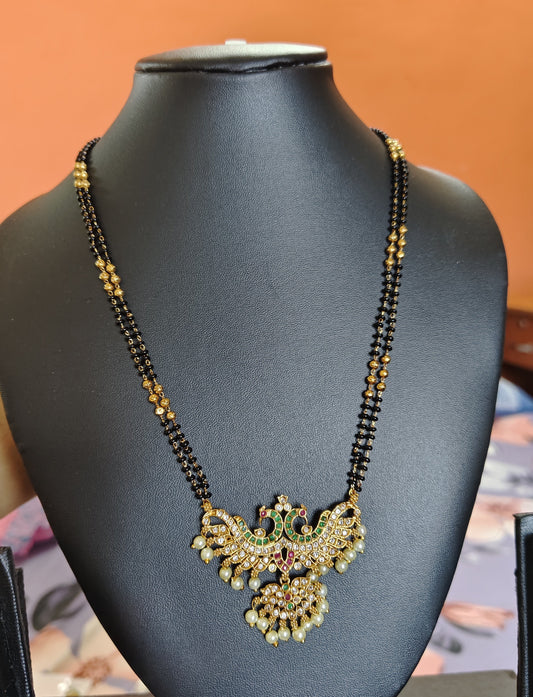 LONG BLACK BEADS WITH STUNNING DOUBLE PEACOCK