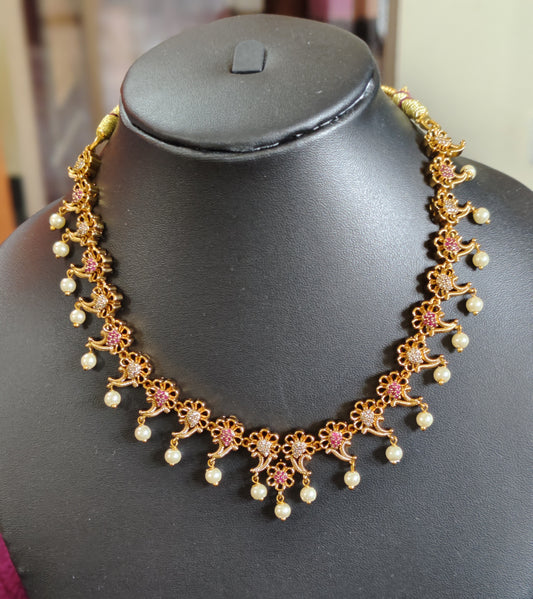 FLOWER DESIGN NECKSET WITH DROPPING PEARLS
