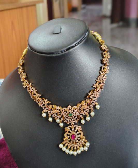 SHORT NECK SET WITH CZ STONE WORK AND PEACOCKS