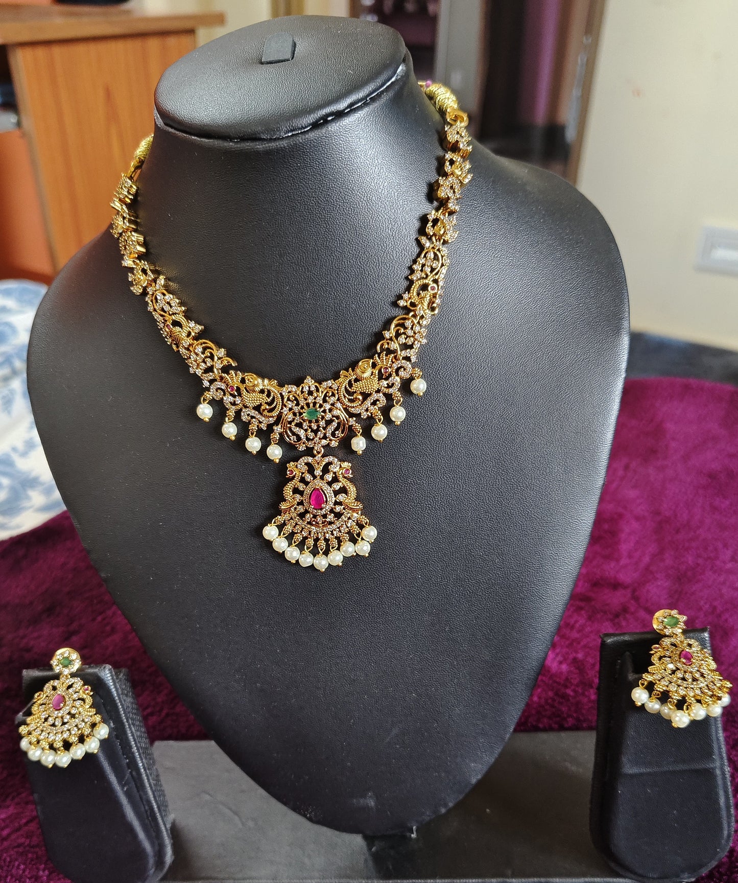 SHORT NECK SET WITH CZ STONE WORK AND PEACOCKS