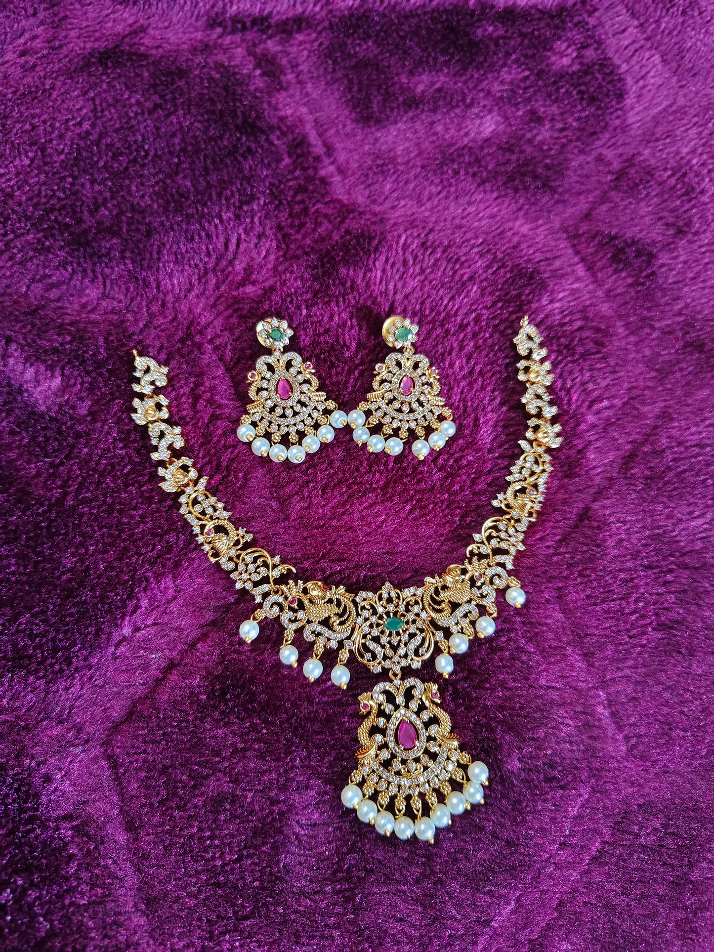 SHORT NECK SET WITH CZ STONE WORK AND PEACOCKS