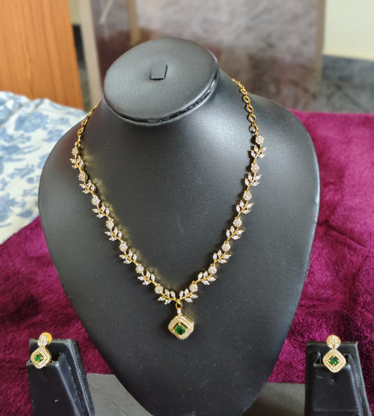 STONE FLOWERS WITH EMERALD PENDANT