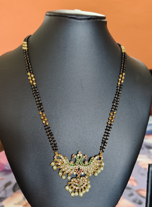 LONG BLACK BEADS WITH STUNNING DOUBLE PEACOCK