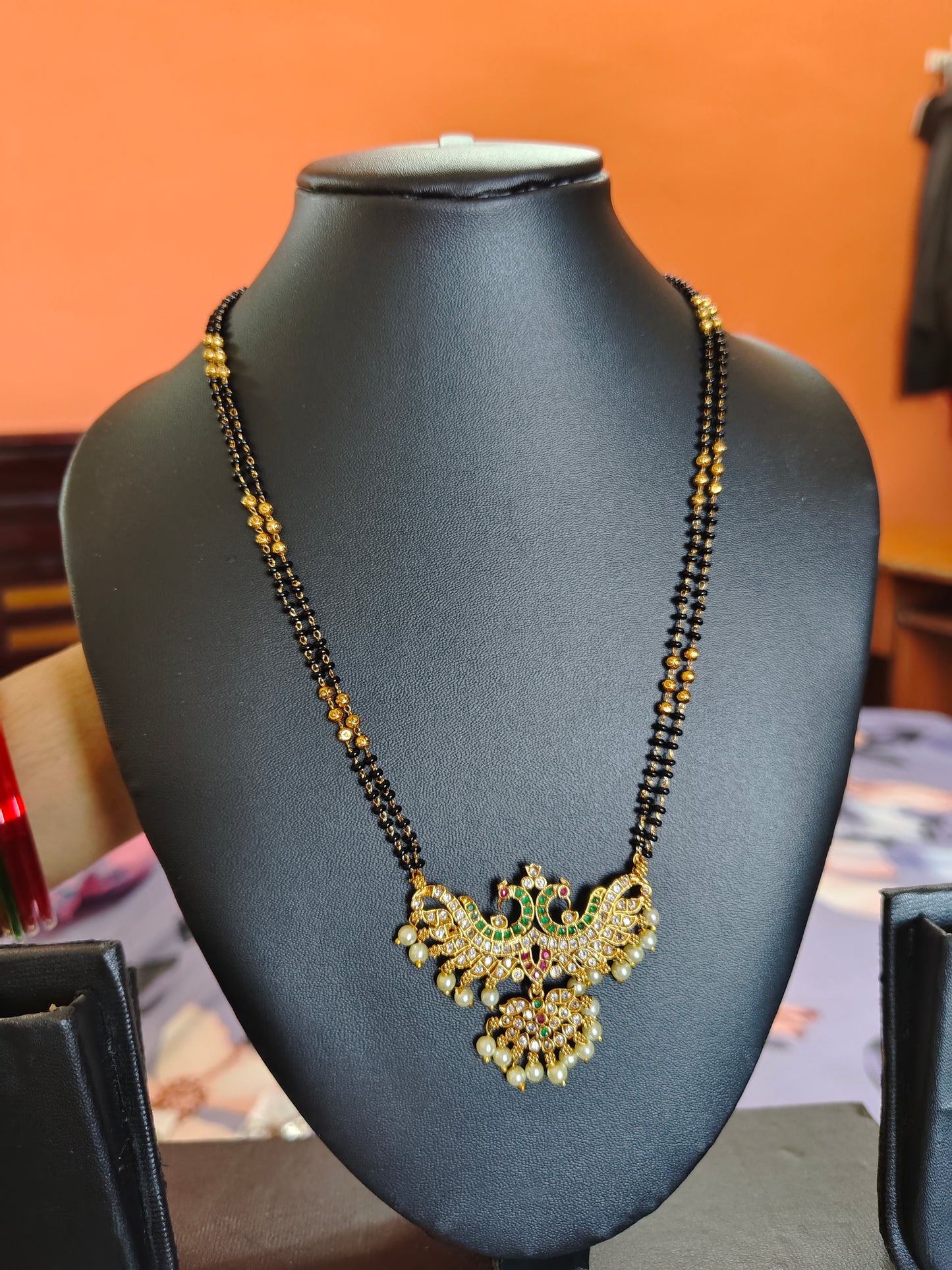 LONG BLACK BEADS WITH STUNNING DOUBLE PEACOCK
